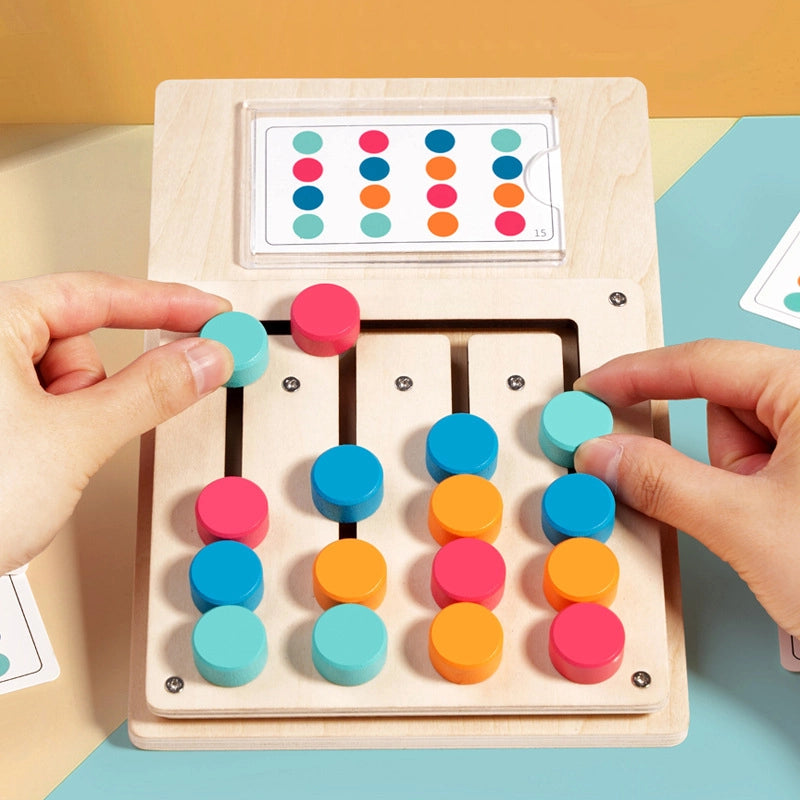 Color sorting toy with colorful buttons and a screen displaying colored dots on a yellow background.